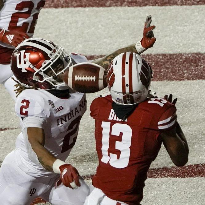 Wisconsin's Chimere Dike can't catch a pass with Indiana defensive back Reese Taylor